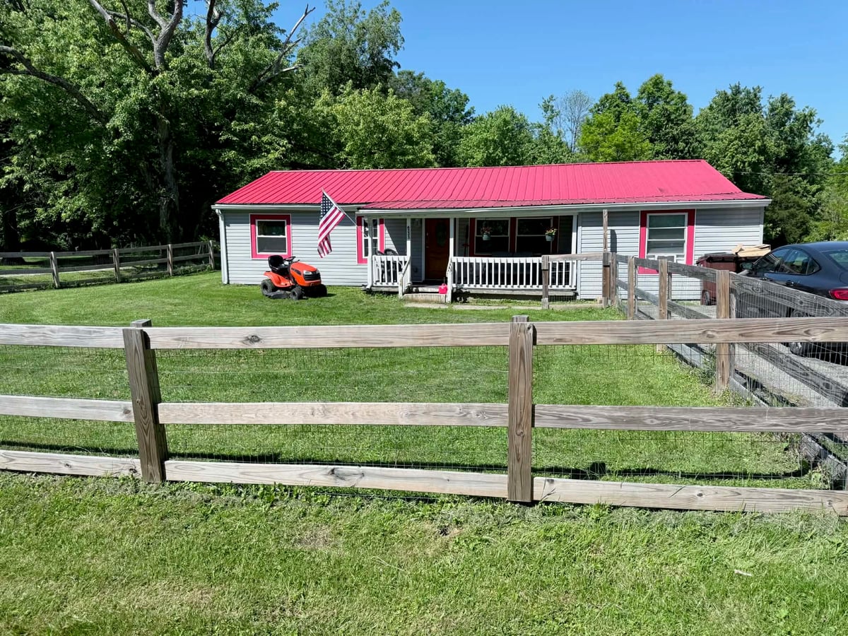 Front exterior of 6333 Manila Rd, Goshen Ohio — centered view of turnkey tenant-occupied rental